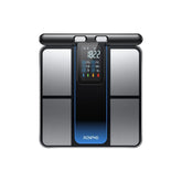 A RENPHO MorphoScan digital Renpho EU body composition scale with an illuminated central display. The screen shows various measurements, including weight, body fat percentage, and BMI. The scale has a sleek black and white design with a touch interface.