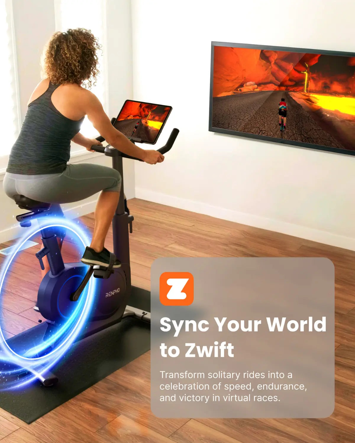 A person with curly hair in athletic wear rides a Renpho EU AI Smart Bike S indoors, viewing a screen displaying bright animated graphics. A wall-mounted TV shows a cyclist on a virtual path. Text overlay reads, "Sync Your World to Zwift," highlighting Diverse Training Programs for an Immersive Fitness Experience.