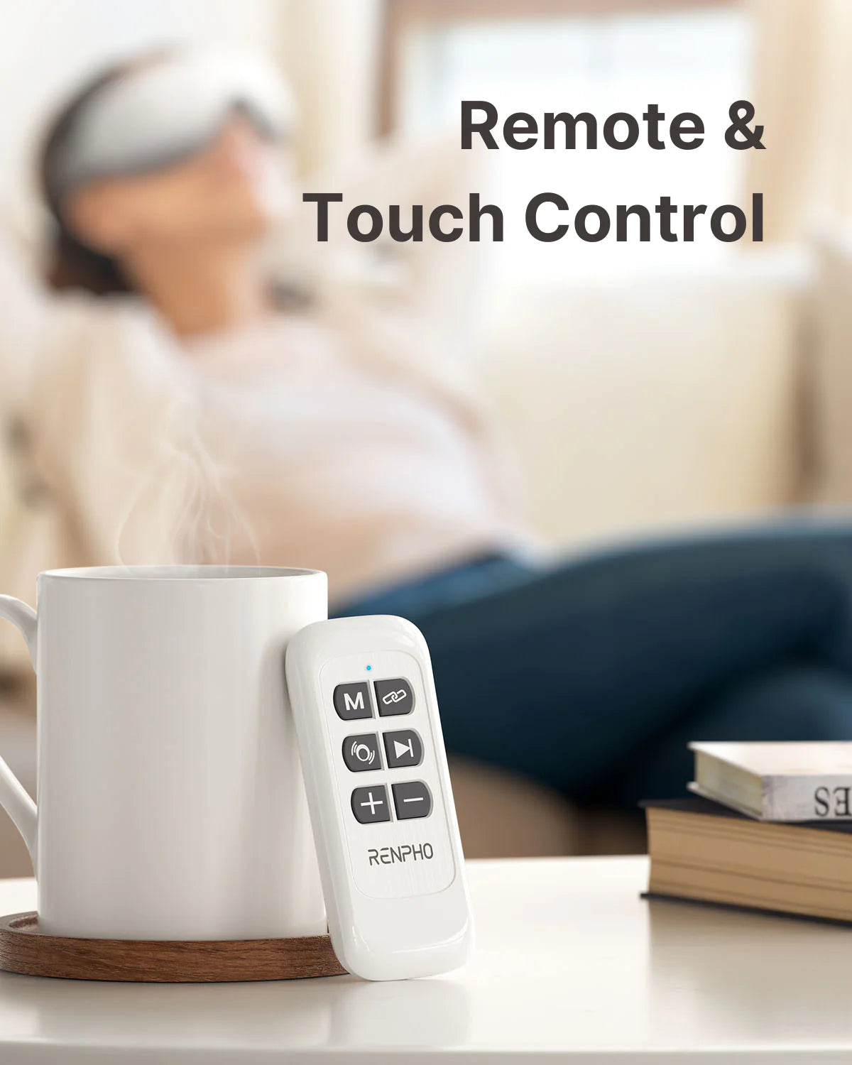 A relaxed person using an Eyeris 1 Eye Massager to relieve eye strain reclines on a couch in the background. In the foreground, a white remote control labeled "Renpho EU" rests next to a steaming white mug on a coaster. Books are stacked nearby. The text "Remote & Touch Control" is displayed near the top.