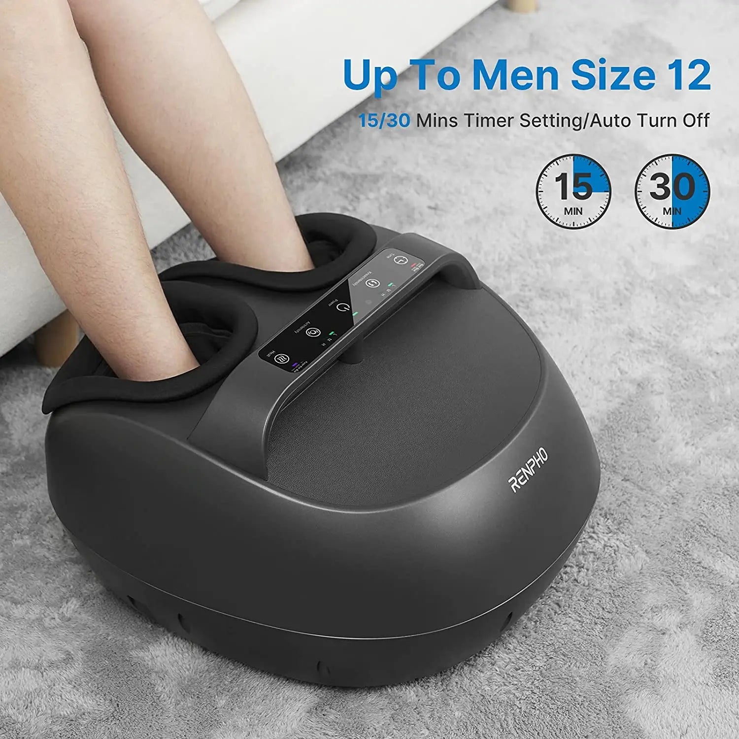 A person is using a black Renpho EU Shiatsu Foot Massager with Handle. Their feet are inserted into two padded openings of the device, enjoying a comforting shiatsu kneading foot massage. The massager rests on a grey carpet. Text on the image reads "Up To Men Size 12" and "15/30 Mins Timer Setting/Auto Turn Off," with timer options for 15 and